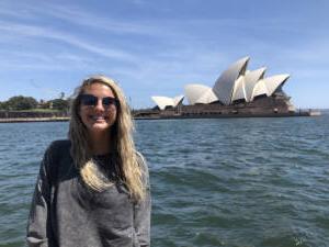 Salem College Study Abroad student standing for a photo with Sydney, Australia in the background.